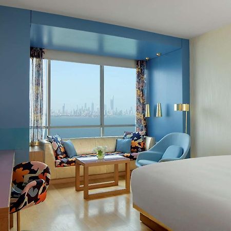 Symphony Style Hotel Kuwait Salmiya Kültér fotó A room at the hotel