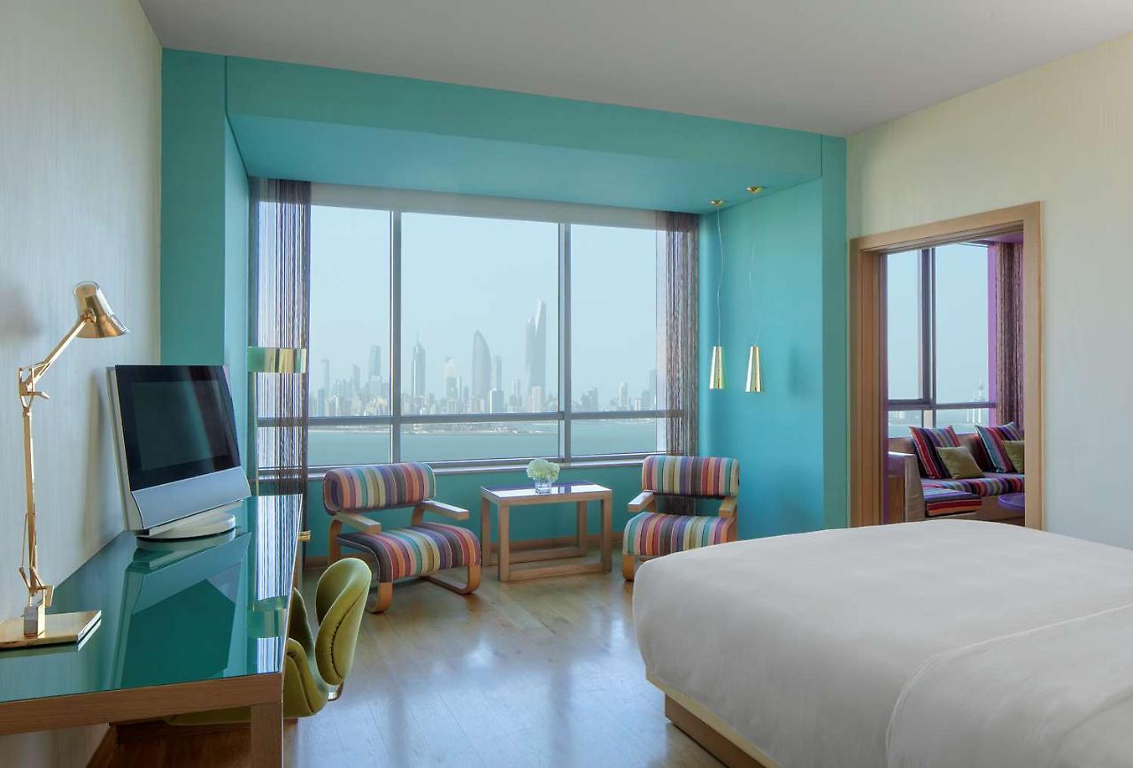 Symphony Style Hotel Kuwait Salmiya Kültér fotó A room at the hotel