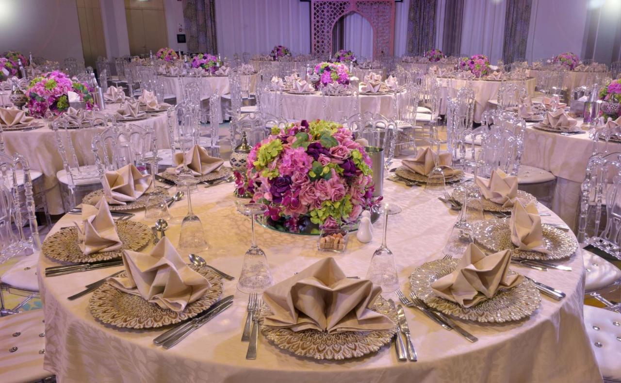 Symphony Style Hotel Kuwait Salmiya Kültér fotó A table set for a formal dinner