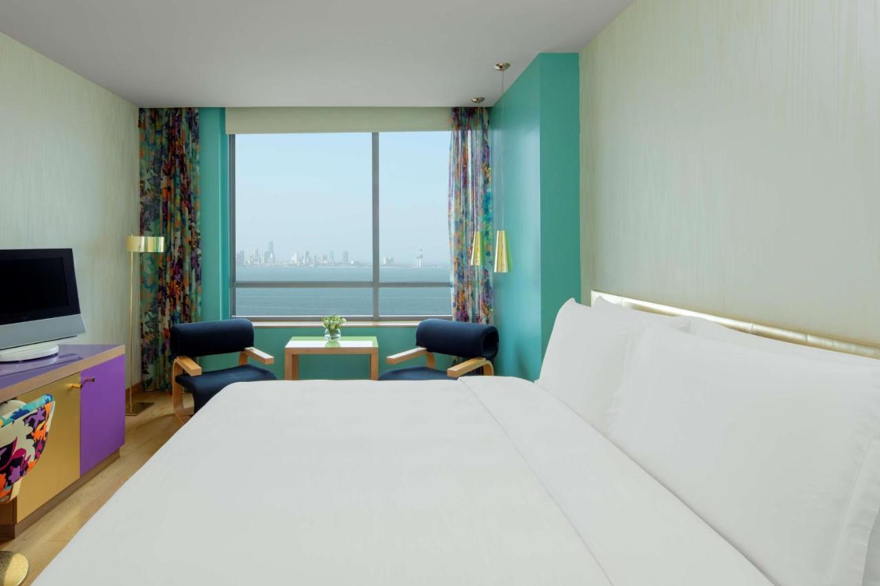 Symphony Style Hotel Kuwait Salmiya Kültér fotó A room at the hotel