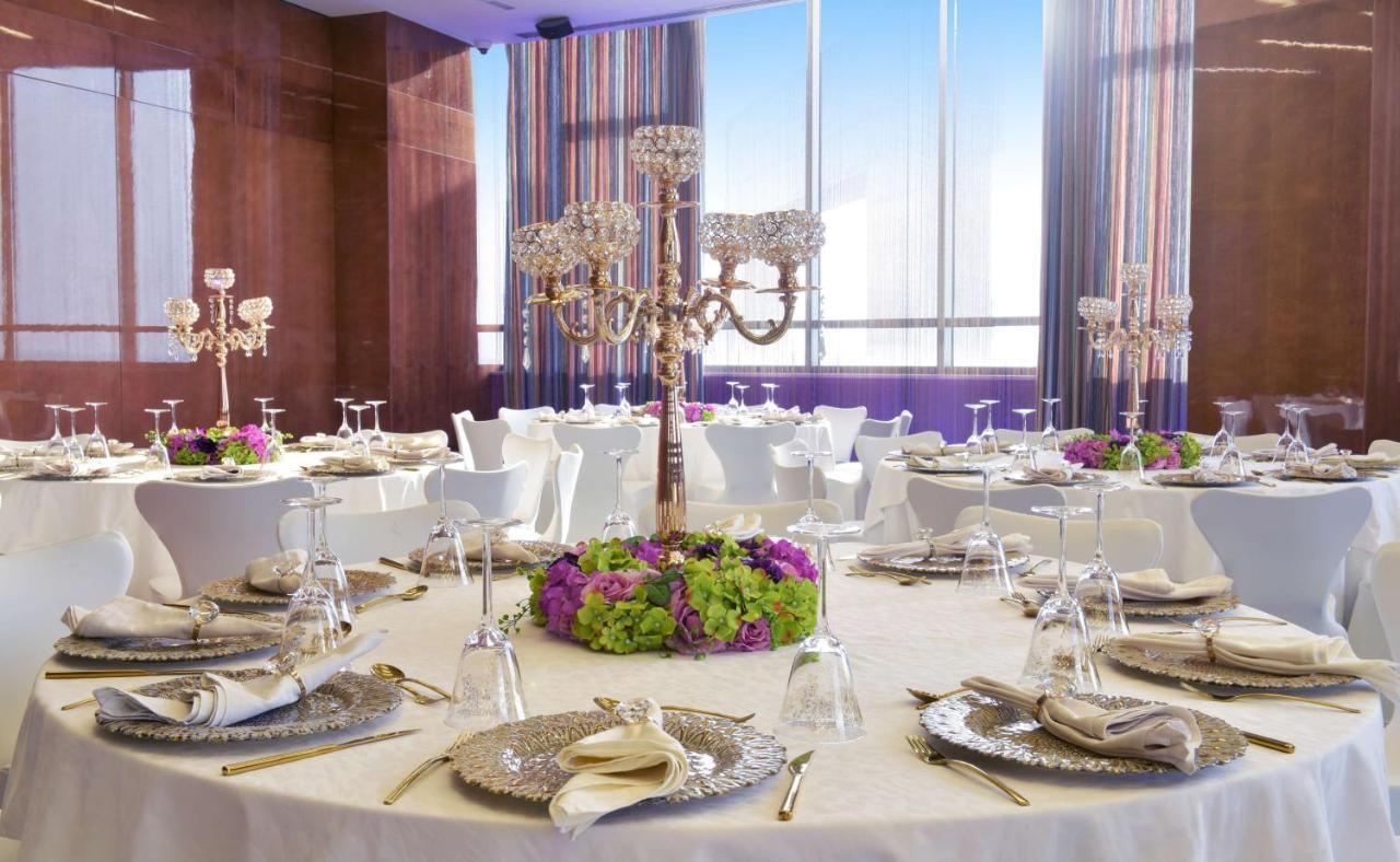 Symphony Style Hotel Kuwait Salmiya Kültér fotó The ballroom at the hotel